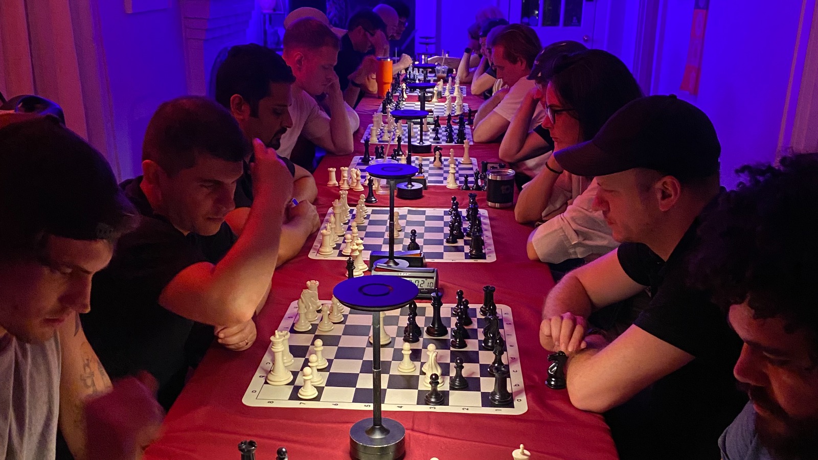 Tampa Knights members playing chess at The Knights Social.